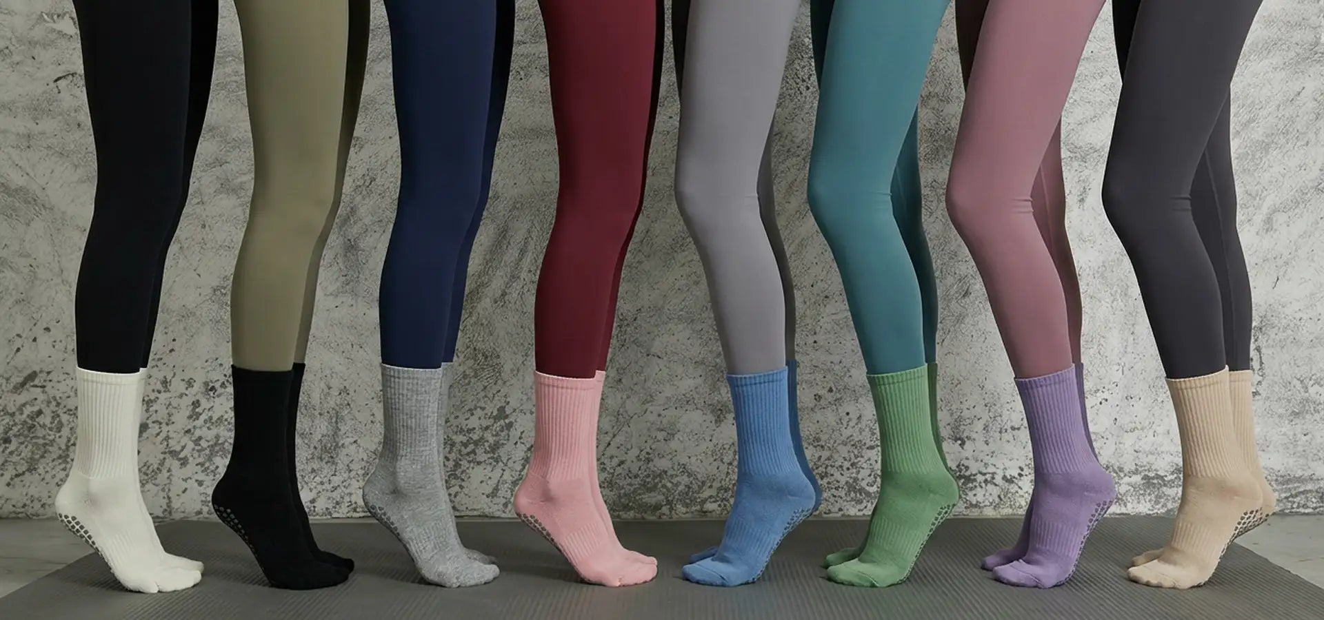 Black grip socks with textured soles and ribbed cuffs.slider_item_W3Mf6h